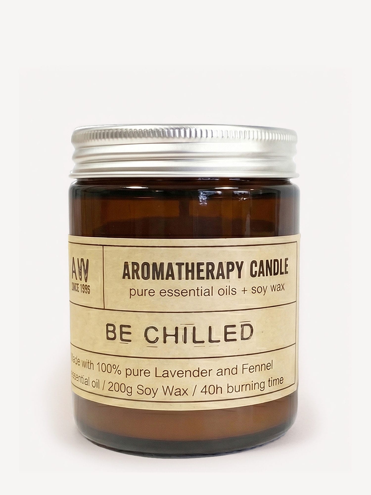 Amber jar Be Chilled lavender soy candle with silver lid and cream label.