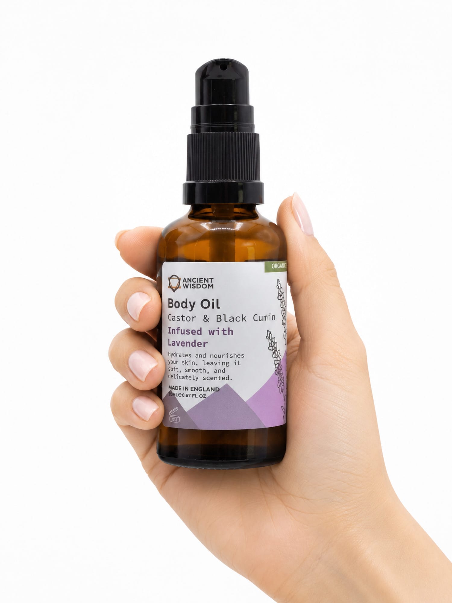Hand holding amber Lavender body oil bottle with black pump and purple label.