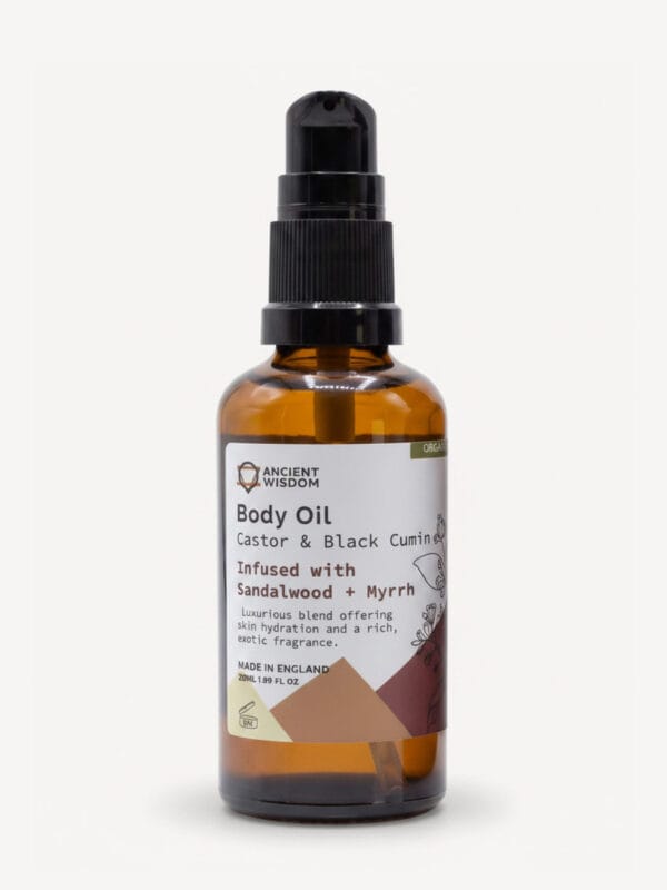 Amber body oil bottle with black pump and white label reading Body Oil infused with Sandalwood and Myrrh.