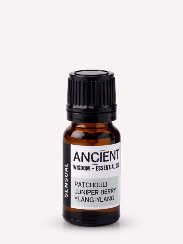 Amber bottle of Sensual Patchouli & Ylang Ylang essential oil blend with black cap and green label.