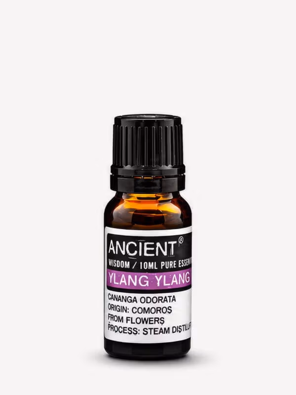 Amber bottle of Ylang Ylang pure essential oil with black cap and purple-banded label.