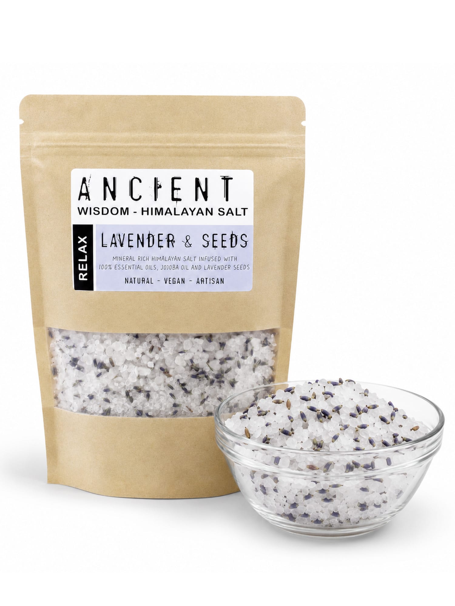 Lavender Moon Himalayan bath salts pouch next to glass bowl of white salt and lavender seeds.