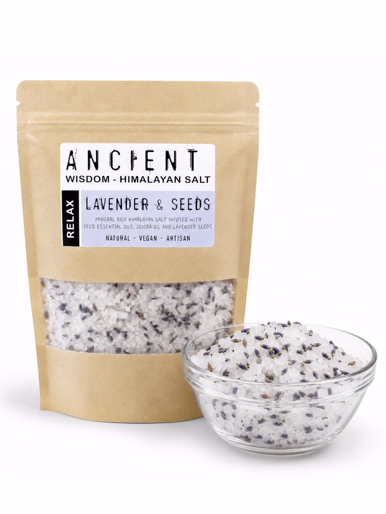 Lavender Moon Himalayan bath salts pouch next to glass bowl of white salt and lavender seeds.