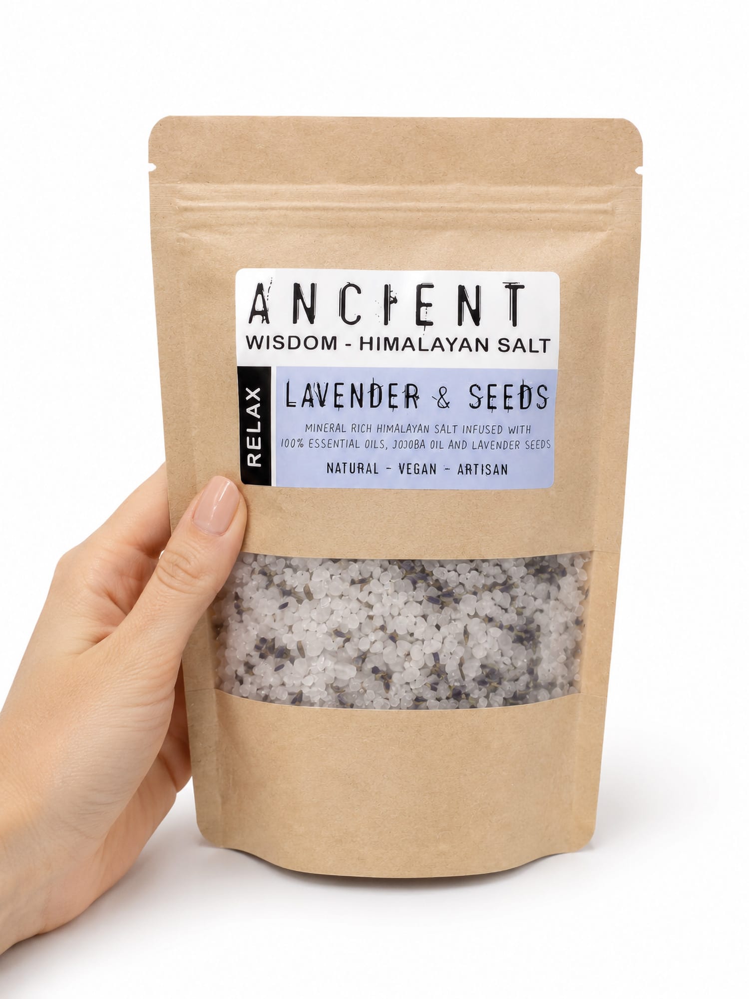 Hand holding Lavender Moon Himalayan bath salts kraft pouch with clear window of salt and lavender.