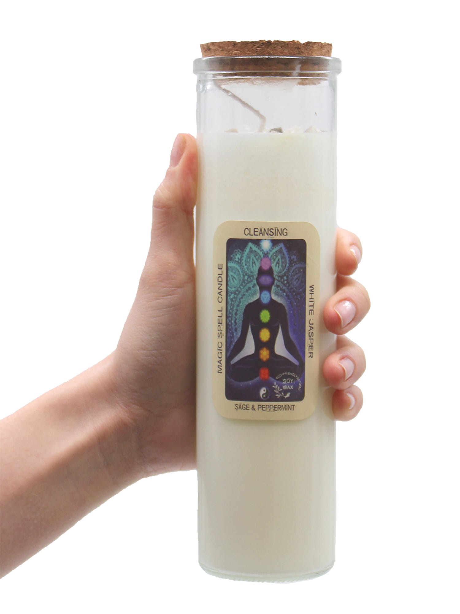 Hand holding Rose Quartz & Jasmine Love Ritual Candle in tall glass jar with cork lid and chakra label.