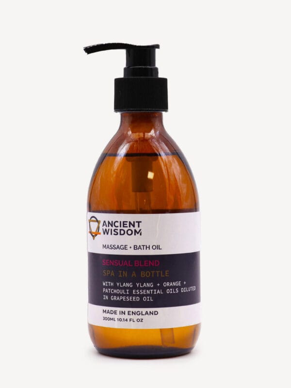 Ylang Ylang Sensual Massage & Bath Oil in large amber pump bottle with black dispenser and purple label.