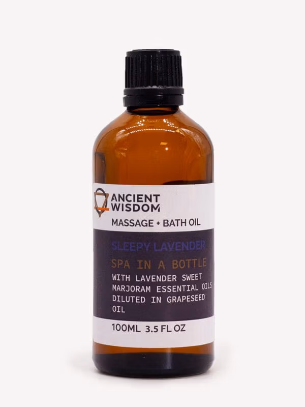Sleepy Lavender Massage Oil in amber bottle with black cap and purple label noting lavender and marjoram.