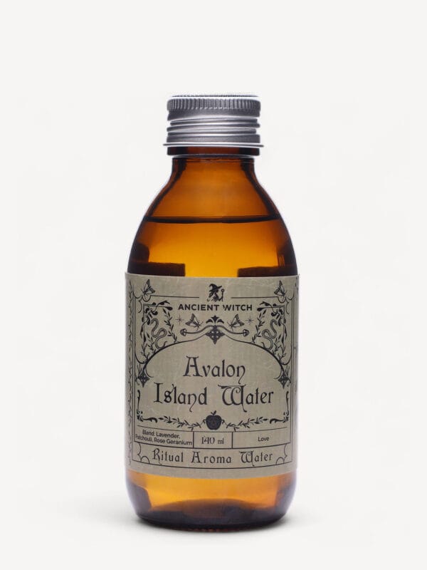 Avalon Island ritual water amber bottle with silver cap and ornate label.