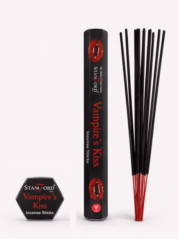 Vampire's Kiss incense sticks with black tube featuring red lips and red-tipped sticks.