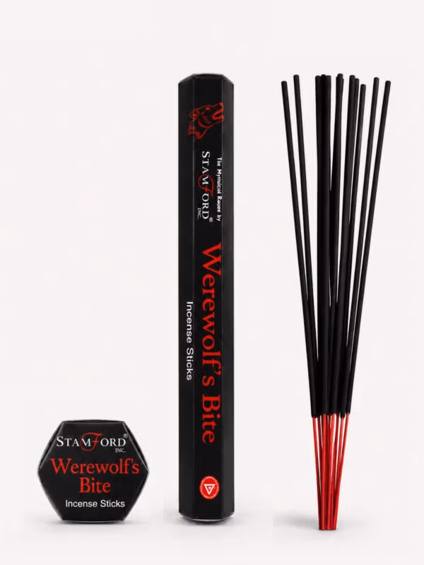 Werewolf's Bite incense sticks with black tube decorated with red wolf head and red-tipped sticks.