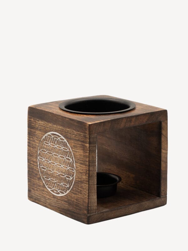 Square dark mango wood oil burner with a Flower of Life engraving, open front, inner tealight bowl and black top dish.