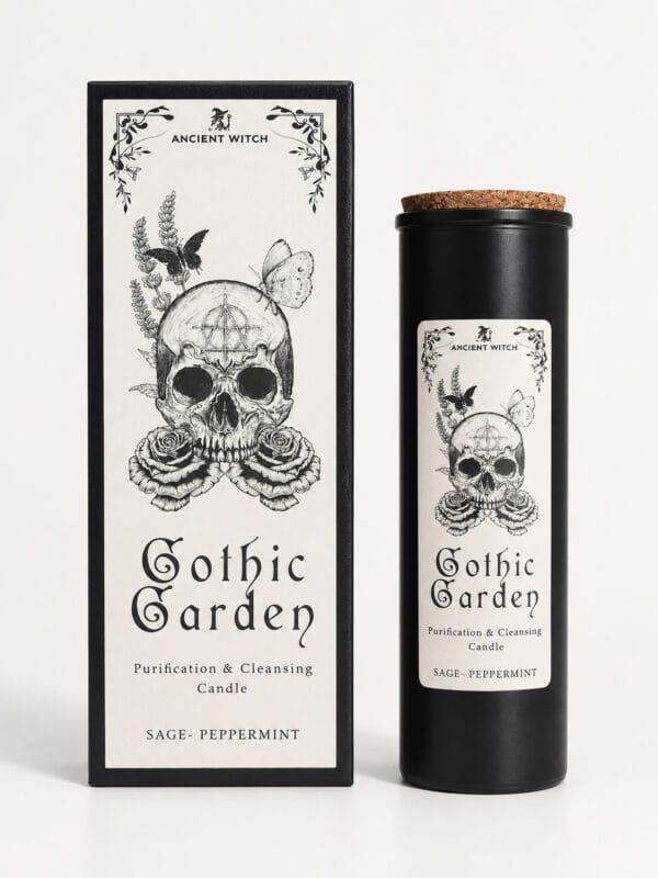 Ancient Witch Gothic Garden sage and peppermint ritual candle in a black glass jar beside its skull-and-rose gift box.