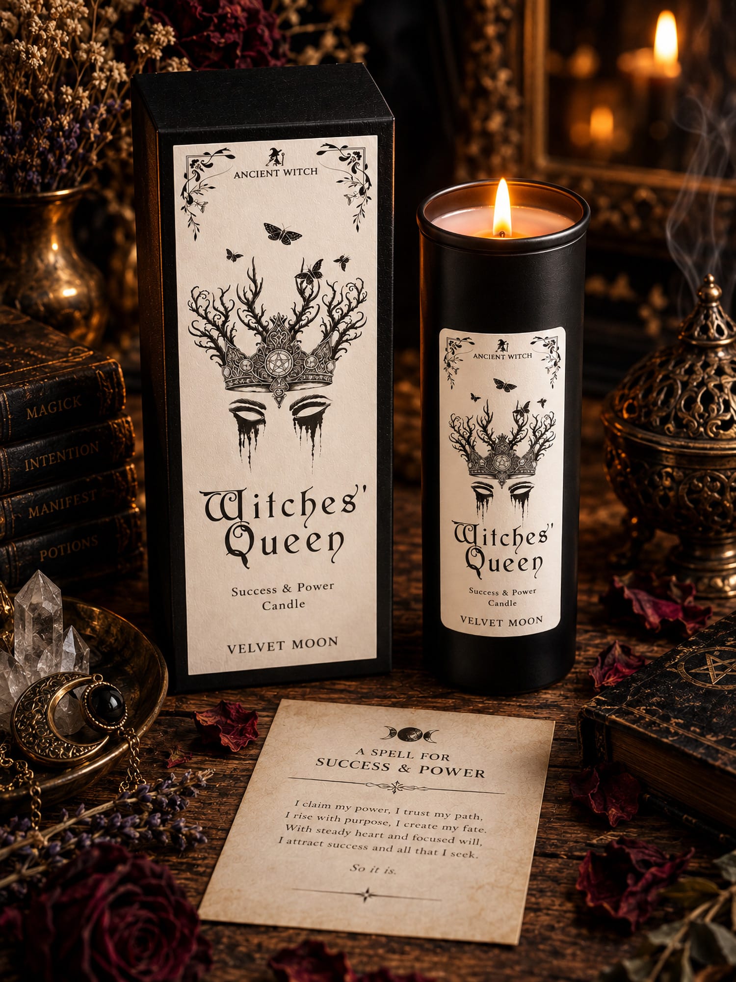 Lit Witches’ Queen Velvet Moon ritual candle with its gift box and success-and-power spell card in a dark mystical setting.